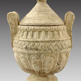 null - Amphora-shaped marble cinerary urn.
