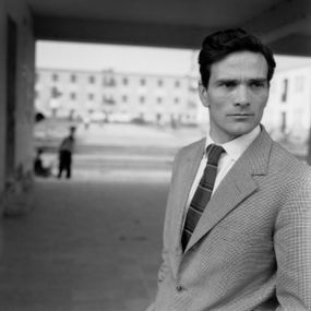 null - Pasolini in the background of the buildings of the township