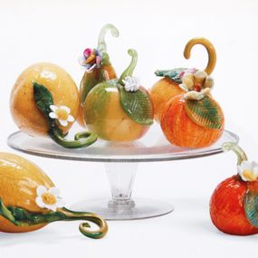 null - Eight glass fruits on a stand