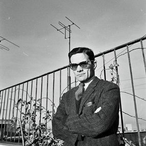 [object Object] - Pier Paolo Pasolini on the roof terrace of the house in Via Giacinto Carini 45