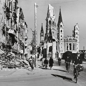 [object Object] - People along a street lined with destroyed buildings