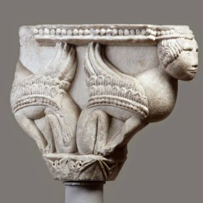 null - Crutch-shaped capital adorned with winged Sphinxes