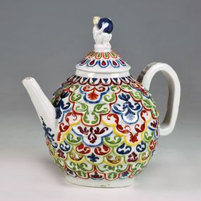 null - Teapot with a scaled surface decorated with leafy spirals