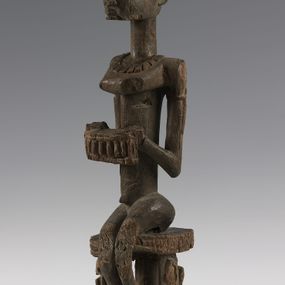 null - Seated male figure