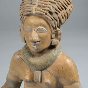 null - Female statuette of a praying woman
