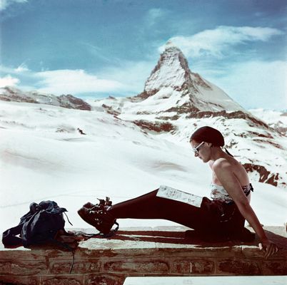 Robert Capa - Skier sunbathing in front of the Mattheron