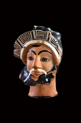 Pitcher (oinochoe) in the shape of the head of Dionysus