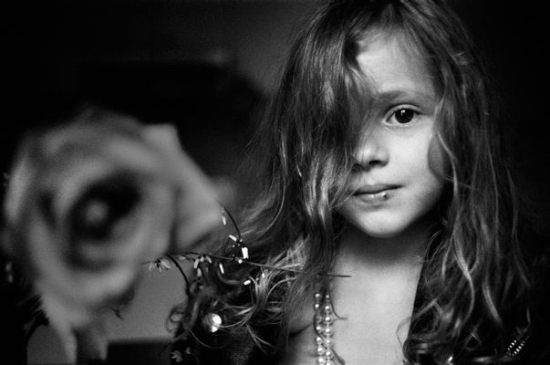 Letizia Battaglia - Little girl and rose