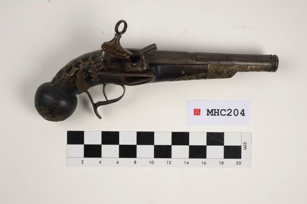 Pistola Miquelet con serratura