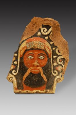 Polychrome architectural terracotta (antefix) with a silenus head
