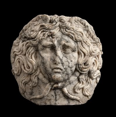 Fragment of a vase with a gorgon's head in relief