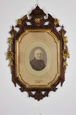 Photographic portrait with lock of hair and autograph of Alessandro Manzoni, frame in pure gold worked with the Manzoni coat of arms
