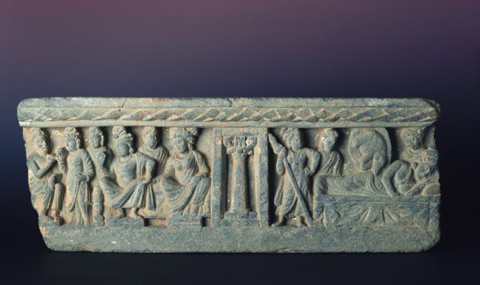 Curvilinear relief fragment with scenes from the life of the Buddha
