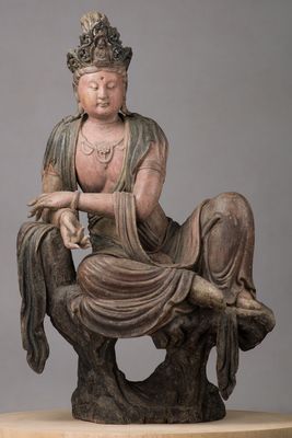 Bodhisattva Guanyin lying in mahārājalīlāsana