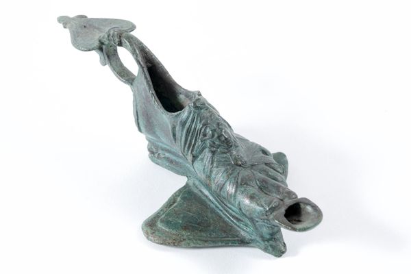 Sandal-shaped bronze oil lamp from the Borgo delle Orsoline treasure chest, Parma