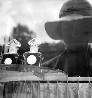 Lee Miller - Reflection of Lee Miller in the Guerlain shopfront window