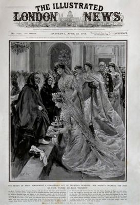 La reine d'Espagne, Victoria Eugénie de Battenberg, lave les pieds