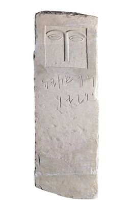 Stele with eyes: human face and Aramaic inscription