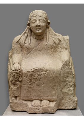  Statue of goddess seated on the throne
