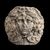Fragment of a vase with a gorgon's head in relief