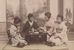 Group of Japanese women in kimono around a tea table