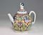 Teapot with a scaled surface decorated with leafy spirals